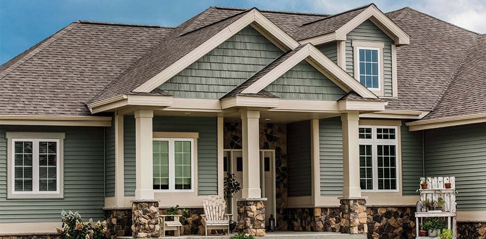 Foundry siding with stone