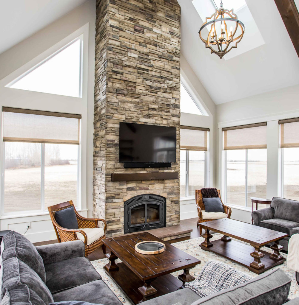 Indoor fireplace made with Versetta Stone Ledgestone in Plum Creek.